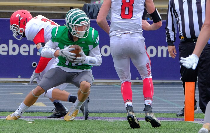 (Leah Hogsten  |  The Salt Lake Tribune) South Summit's Keegan Stracher runs into the end zone for a touchdown.   South Summit High School boys' football team leads Grand County High School 34-3 during their class 2A state semifinal football game Saturday, November 4, 2017 at Weber State University's Stewart Stadium.