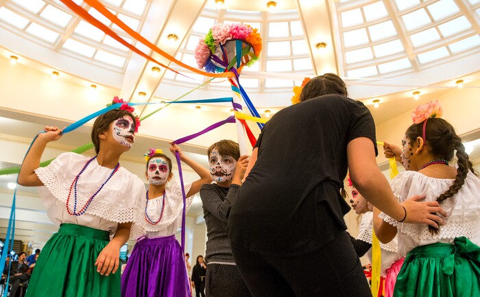 (Leah Hogsten | The Salt Lake Tribune) The Arte Primero dancers prepare to dance the Ribbon Dance as part of the Day of the Dead festival Saturday, October 21, 2017 at the Capitol.