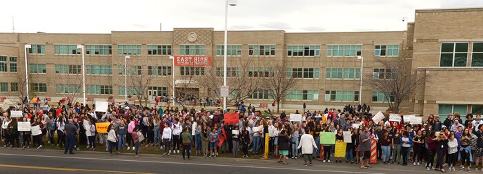 (Leah Hogsten  |  The Salt Lake Tribune) East High School students took to the sidewalk of 13th East to raise awareness and push for change. Exactly one month after 17 people were killed at Marjory Stoneman Douglas High School in Parkland, survivors of the massacre joined tens of thousands of students across the United States by walking out of school,  Wednesday, March 14, 2018. 