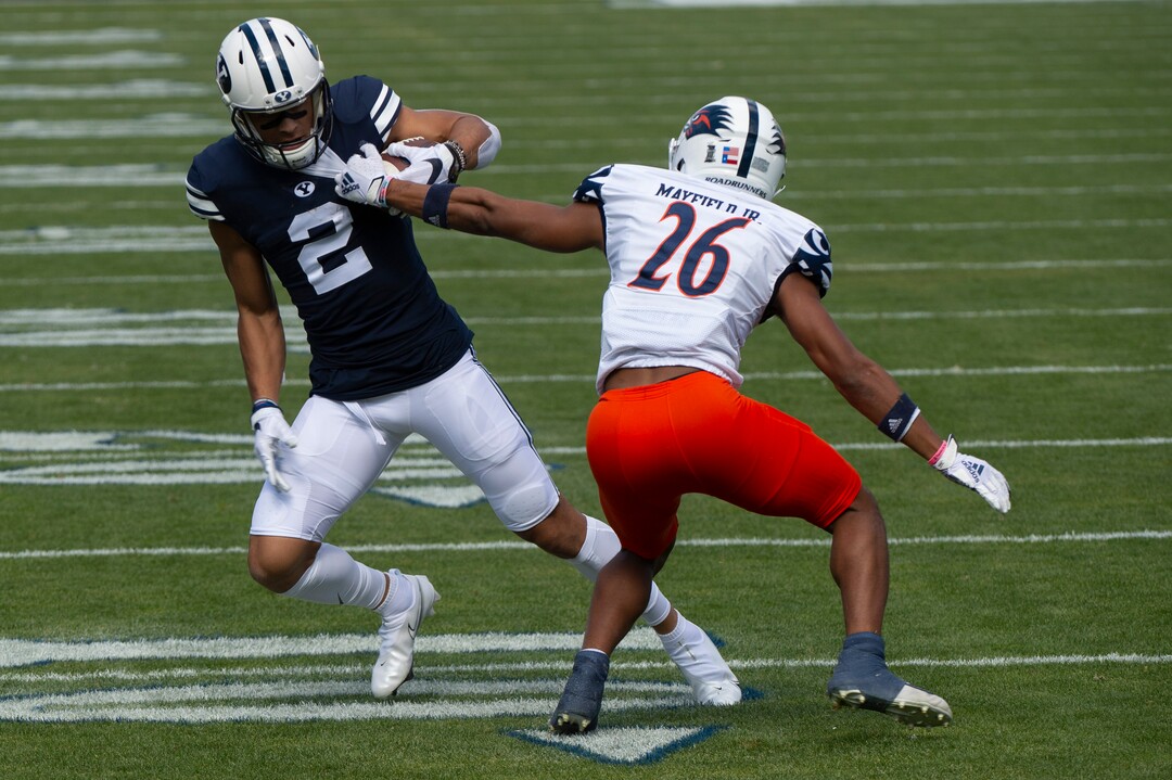 (Rick Egan  |  The Salt Lake Tribune)    Brigham Young Cougars wide receiver Neil Pau'u (2) has the ball stripped by UTSA Roadrunners cornerback Corey Mayfield Jr. (26), resulting in a fumble, in football action between the Brigham Young Cougars and the UTSA Roadrunners, at Lavell Edwards stadium, Saturday, Oct. 10, 2020.
