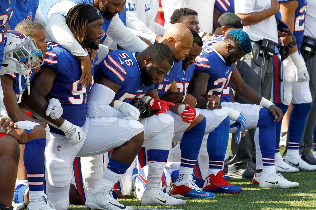 (AP Photo/Jeffrey T. Barnes) Buffalo Bills players kneel during the national anthem prior to an NFL football game against the Denver Broncos, Sunday, Sept. 24, 2017, in Orchard Park, N.Y.