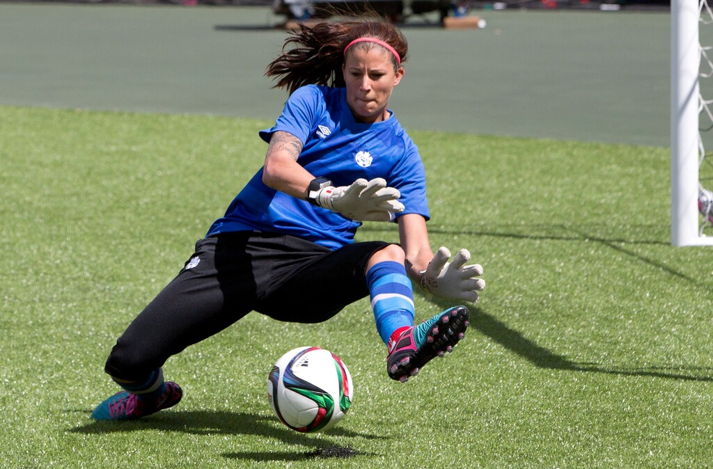 FILE - In this June 5, 2015, file photo, Canada's goalkeeper goalkeeper Stephanie Labbe makes a save during soccer practice in Edmonton, Alberta. Labbe wondered if people valued the bronze medal she won in soccer more than they valued her as an individual. She sank into depression. It wasn’t the first time Labbe has wrestled with depression, and she says it likely won’t be the last. But speaking out about it has become one of the most important aspects of her recovery. (Jason Franson/The Canadian Press via AP, File)