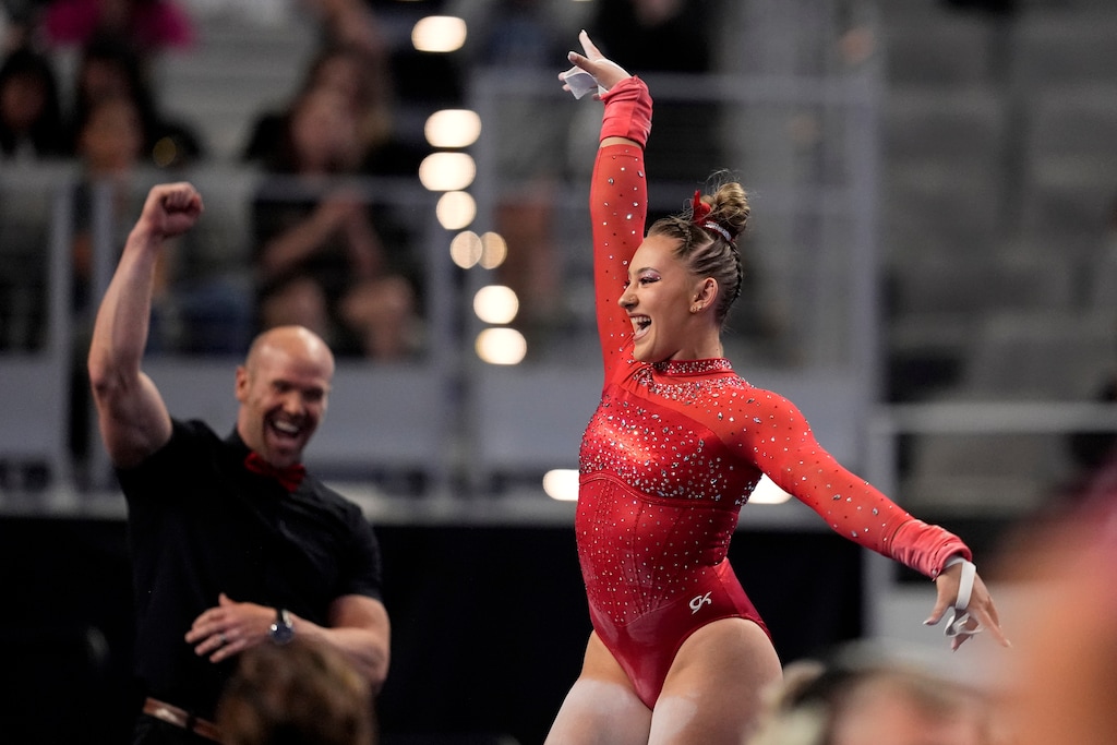 (Tony Gutierrez | AP) Utah's Makenna Smith celebrates after her uneven-bars routine during the NCAA women's gymnastics championships in Fort Worth, Texas, Thursday, April 18, 2024.
