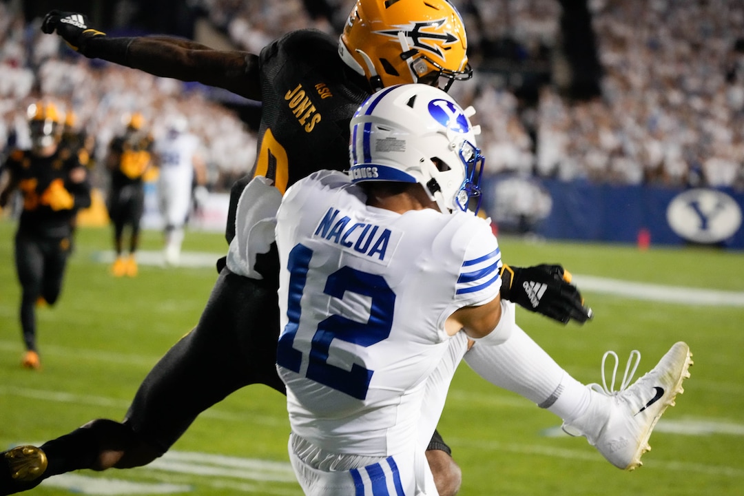 (Francisco Kjolseth | The Salt Lake Tribune) Brigham Young Cougars wide receiver Puka Nacua (12) comes close to receiving the ball for a touchdown but is pressured by Arizona State Sun Devils defensive back Jack Jones (0) at the line in football action between the Brigham Young Cougars and the Arizona State Sun Devils at LaVell Edwards Stadium in Provo, on Saturday, Sept. 18, 2021.
