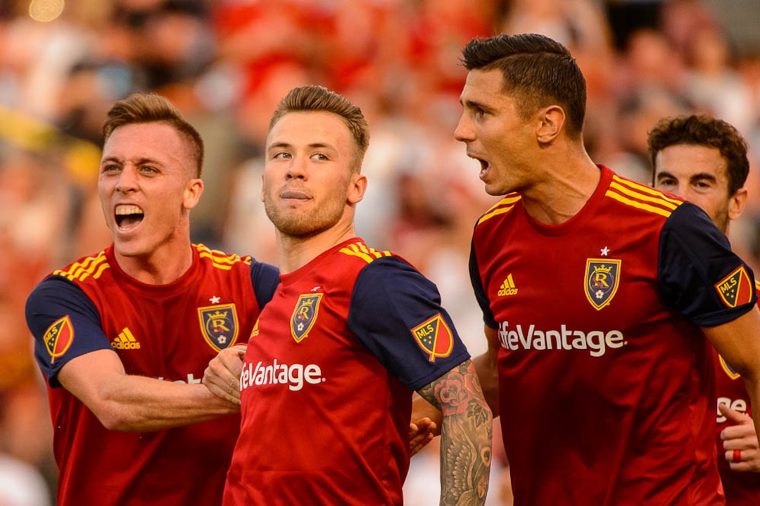(Trent Nelson | The Salt Lake Tribune)  Real Salt Lake hosts FC Dallas, MLS soccer at Rio Tinto Stadium in Sandy, Saturday July 7, 2018. Real Salt Lake forward Corey Baird (27), Real Salt Lake midfielder Albert Rusnak (11) and Real Salt Lake midfielder Damir Kreilach (6) celebrate a penalty kick goal by Rusnak.