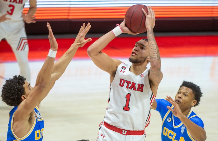(Rick Egan | The Salt Lake Tribune) Utah  forward Timmy Allen (1) shoots for the Utes, in PAC-12 basketball action at the Jon M. Huntsman Center, on Thursday, Feb. 25, 2021.