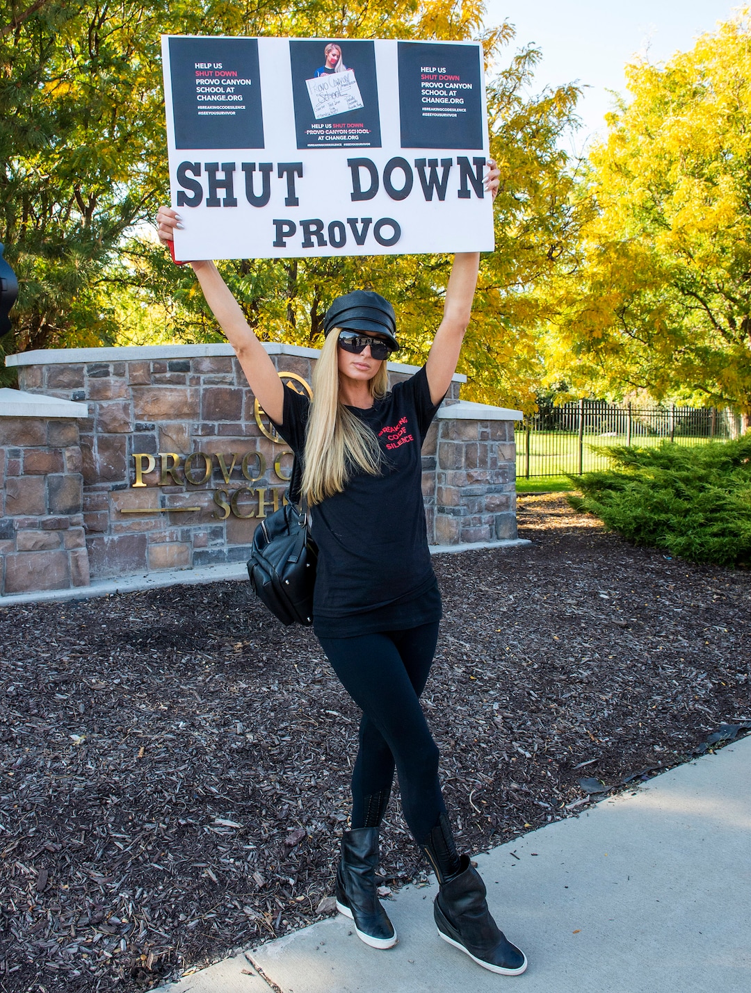 (Rick Egan  |  The Salt Lake Tribune)    Paris Hilton poses for a photo in front of the Provo Canyon School, during a rally and march calling  for the closure of Provo Canyon School, a residential treatment center in Utah she attended when she was a teen, on Friday, Oct. 9, 2020.