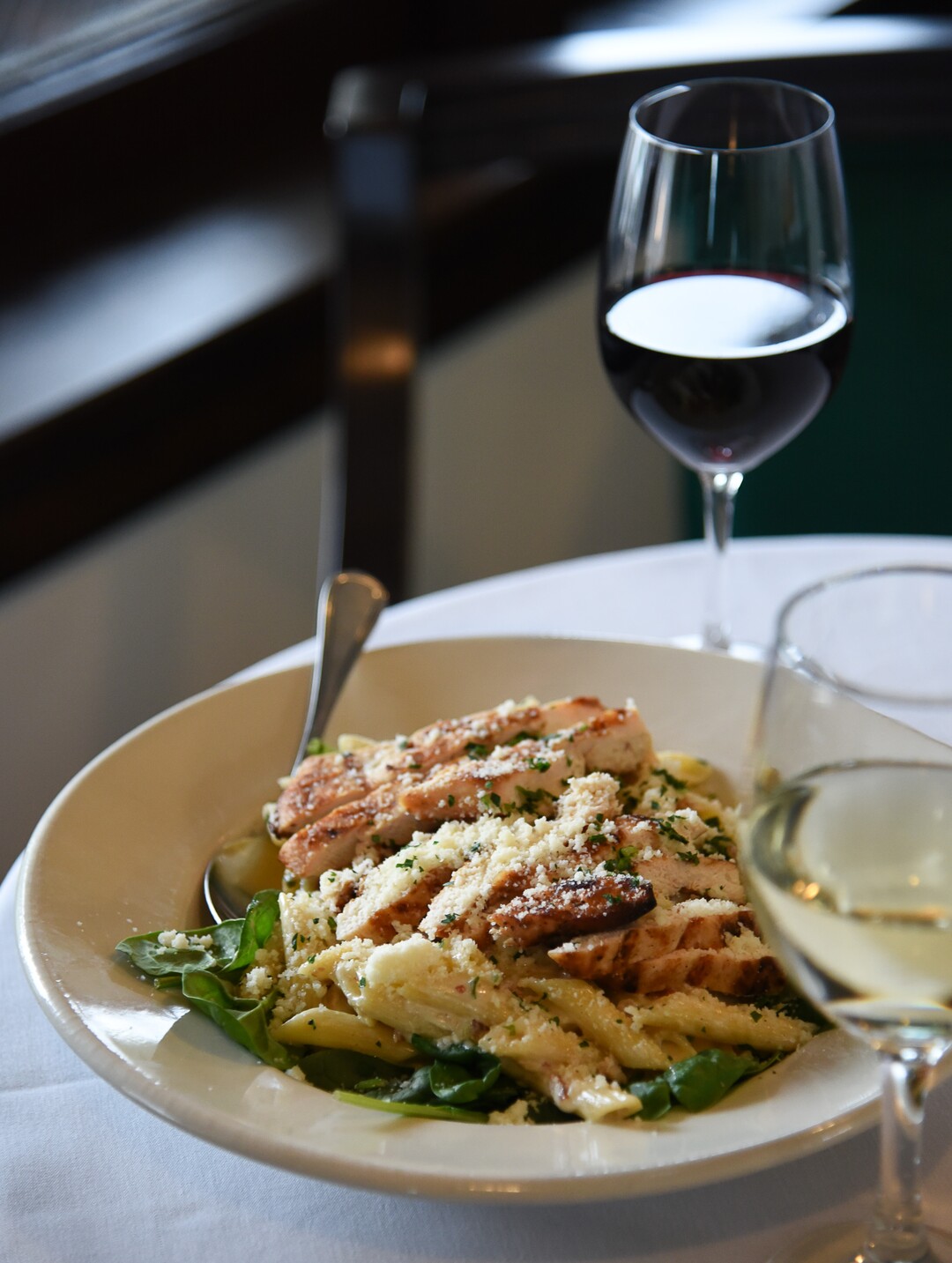 (Francisco Kjolseth  |  The Salt Lake Tribune)  Imported penne pasta, in a bacon-alfredo sauce on spinach with grilled chicken breast at Caffe Molise, recently opened in its new location inside the old (but completely updated) Eagle Building on the southwest corner of 400 South and West Temple.