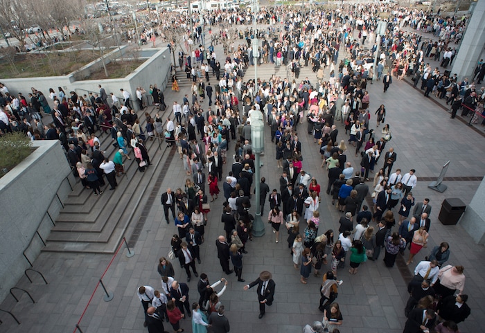 (Rick Egan  |  The Salt Lake Tribune)         LDS faithful wait in line to enter the Conference Center, for the Saturday morning session of the188th Annual General Conference in Salt Lake City,  Saturday, March 31, 2018.