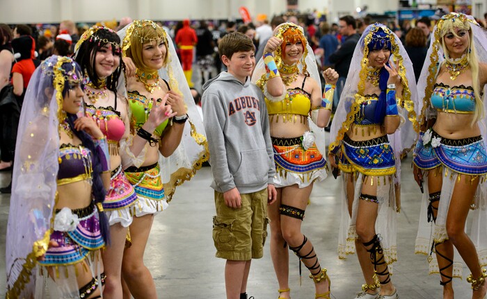 (Steve Griffin  |  The Salt Lake Tribune)  Women pose for a photograph at the Salt Lake Comic Con in Salt Lake City Friday September 22, 2017.