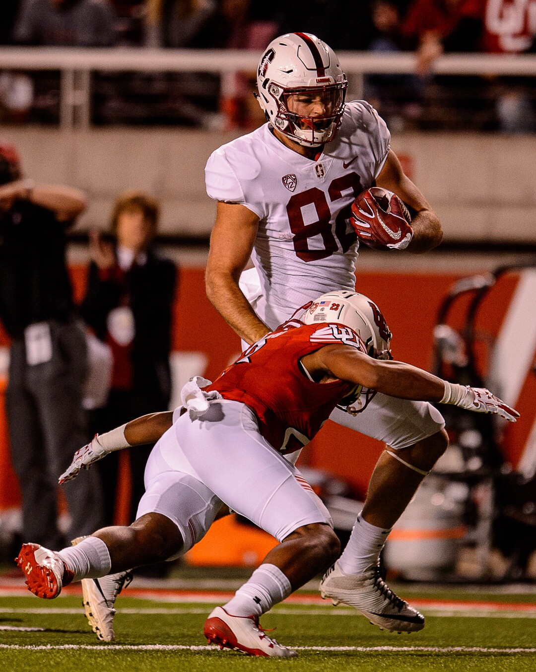 (Trent Nelson | The Salt Lake Tribune)  Utah Utes defensive back Julian Blackmon (23) dives at Stanford Cardinal tight end Kaden Smith (82) as the University of Utah hosts Stanford, NCAA football at Rice-Eccles Stadium in Salt Lake City Saturday October 7, 2017.