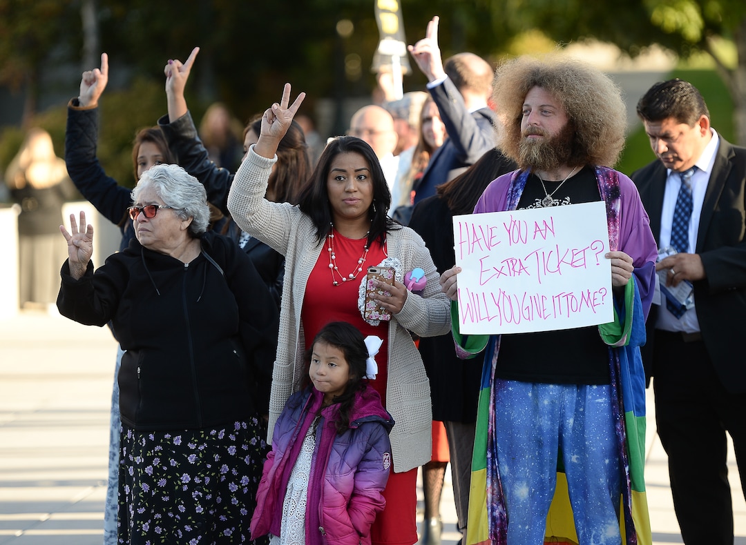 (Francisco Kjolseth  |  The Salt Lake Tribune)  Riley Workman of Payson, Utah, joins those hoping for an entry ticket as people arrive for the Sunday session of the 189th twice-annual General Conference of The Church of Jesus Christ of Latter-day Saints at the Conference Center in Salt Lake City on Sunday, Oct. 6, 2019.