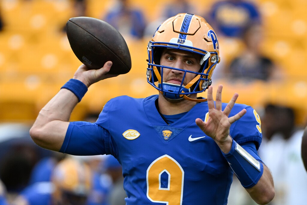 (Barry Reeger | AP) Quarterback Kedon Slovis (9) warms up for a game against Syracuse Saturday, Nov. 5, 2022, in Pittsburgh, Pa. The former USC and Pitt quarterback has transferred to BYU for his final year of eligibility.