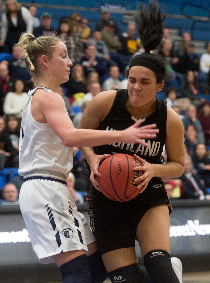 (Rick Egan | The Salt Lake Tribune) Highand High Rams Kaija Glasker (22) tries to get off a shot, as Corner Canyon Chargers Nicole Critchfield (5) defends, in Class 5A women's basketball playoff game between Corner Canyon and Highland, Monday, Feb. 19, 2018.