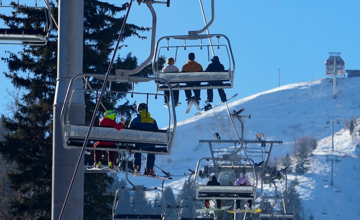(Bethany Baker | The Salt Lake Tribune) Skiers and snowboarders ride the lift at Sundance Resort near Provo on Thursday, Dec. 14, 2023.