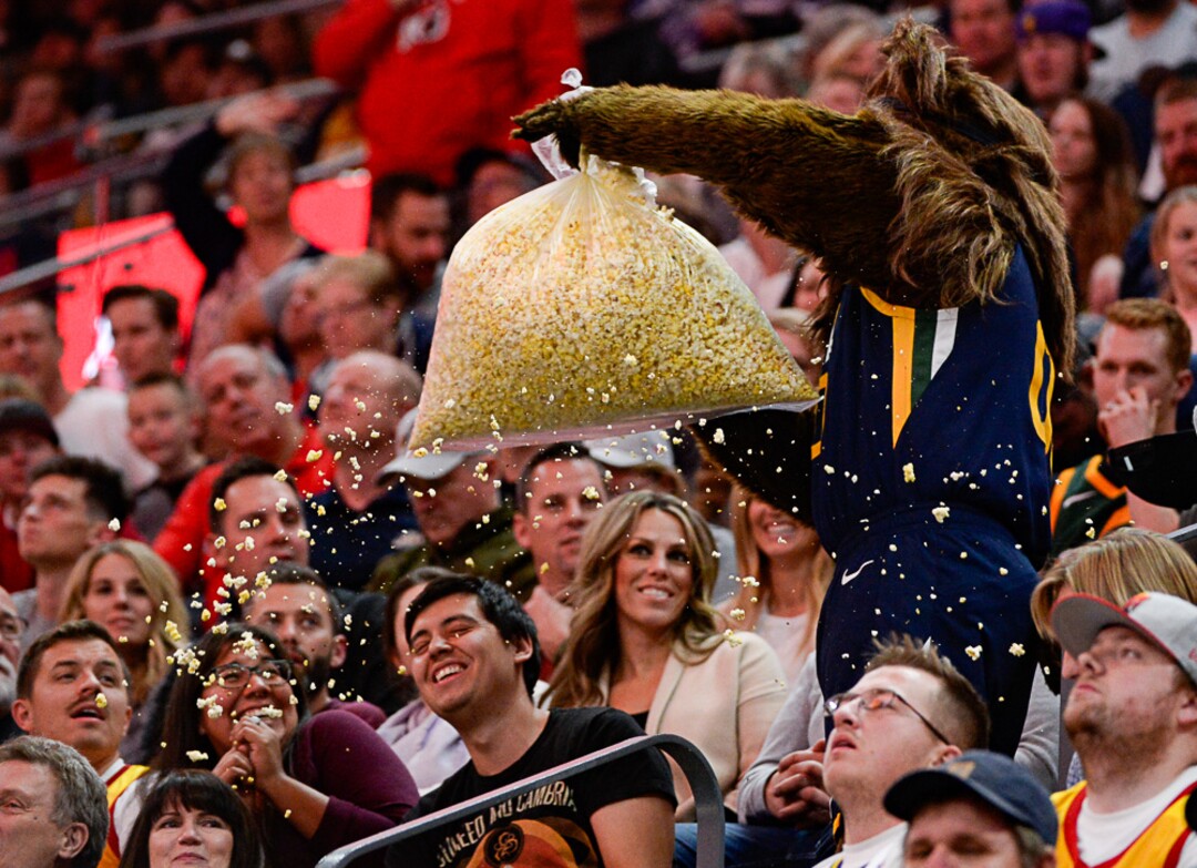 (Francisco Kjolseth  |  The Salt Lake Tribune)  Bear spins a popcorn bag and throws it into the crowd as the Utah Jazz host the New Orleans Pelicans in their NBA basketball game at Vivint Smart Home Arena in Salt Lake City on Sat. Nov. 23, 2019.