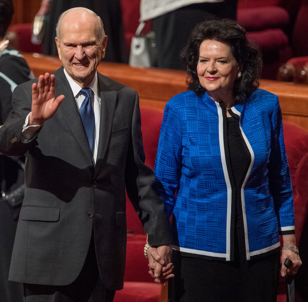 (Rick Egan  |  The Salt Lake Tribune)         President Russel M. Nelson waves to the crowd as he leaves the stand with his wife sister Wendy Nelson, at the conclusion of the Saturday morning session of the 188th Annual General Conference in Salt Lake City,  Saturday, March 31, 2018.