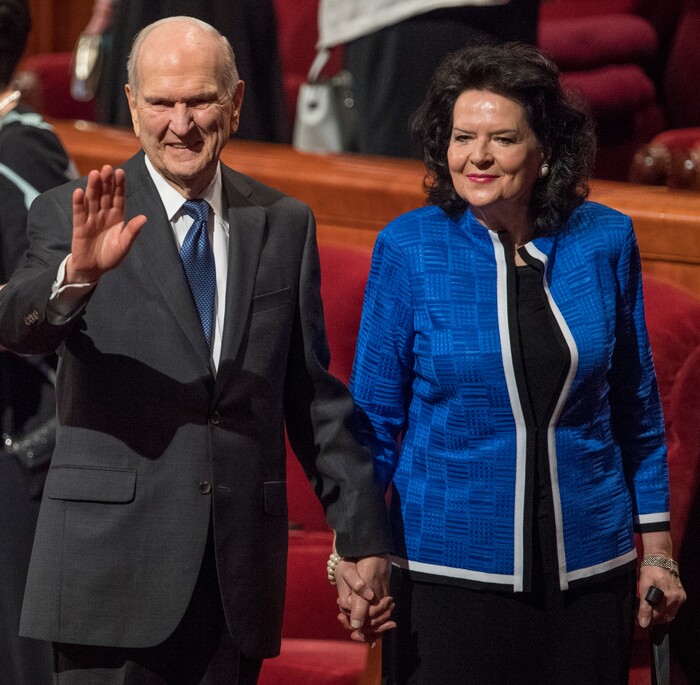(Rick Egan  |  The Salt Lake Tribune)         President Russel M. Nelson waves to the crowd as he leaves the stand with his wife sister Wendy Nelson, at the conclusion of the Saturday morning session of the 188th Annual General Conference in Salt Lake City,  Saturday, March 31, 2018.