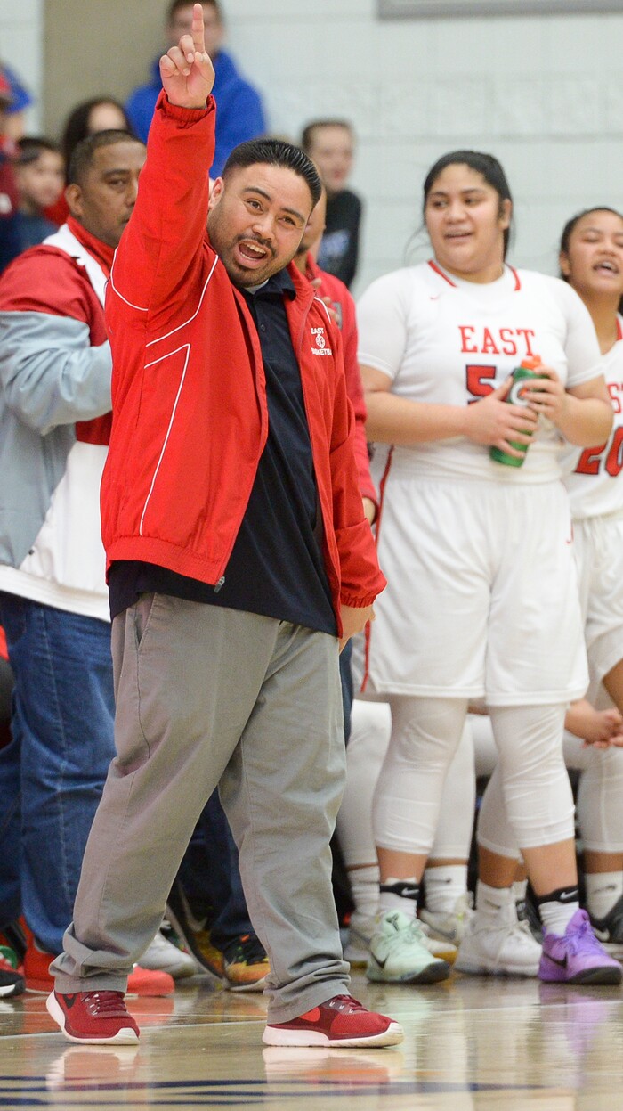 (Leah Hogsten  |  The Salt Lake Tribune) East's head coach Olosaa Solovi.  East faces Timpview in the championship game of the 5A High School Girls' Basketball Tournament at SLCC in Taylorsville, Saturday, Feb. 24, 2018.