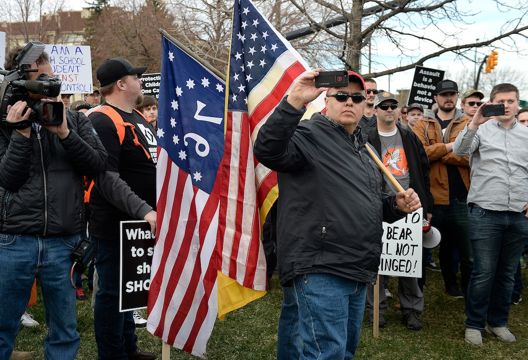 Scott Sommerdorf | The Salt Lake Tribune
Pro-gun March Before Our Lives marchers rally across the street from West High School, Saturday, March 24, 2018.