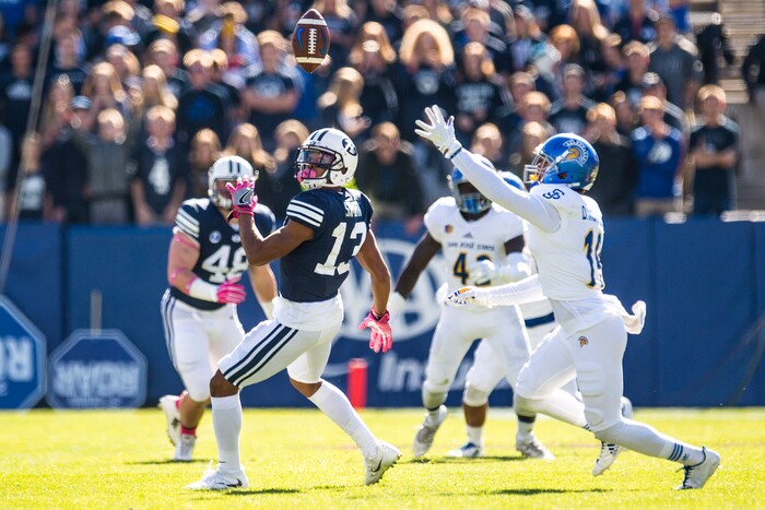 (Chris Detrick  |  The Salt Lake Tribune)  San Jose State Spartans cornerback Dakari Monroe (19) intercepts the ball intended for Brigham Young Cougars wide receiver Micah Simon (13) during the game at LaVell Edwards Stadium Saturday, October 28, 2017.  