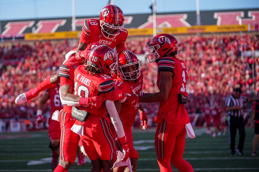 (Trent Nelson  |  The Salt Lake Tribune) Utah players celebrate a touchdown by Utah Utes wide receiver Money Parks (10) as the Utah Utes host the Florida Gators in Salt Lake City on Thursday, Aug. 31, 2023.