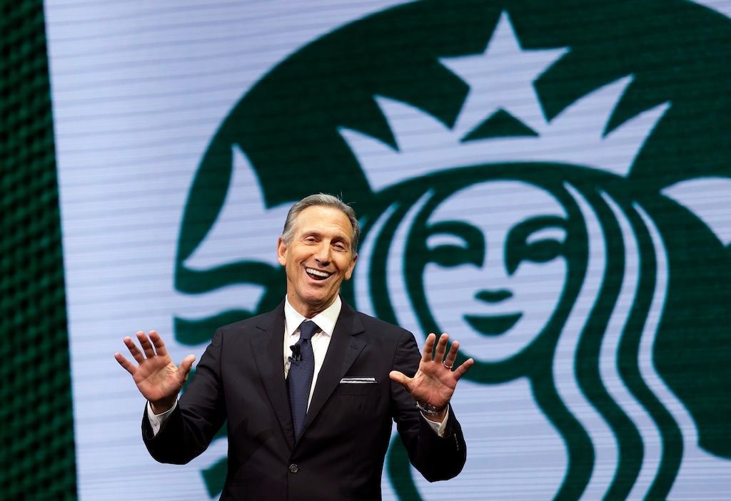 FILE - In this March 22, 2017 file photo, Starbucks CEO Howard Schultz speaks at the Starbucks annual shareholders meeting in Seattle. For someone who has given about $150,000 to Democratic campaigns over the years, Schultz is generating tepid, or even hostile, responses within the party as he weighs a presidential bid in 2020. That's because reports have suggested he's considering running as an independent, a prospect that could draw support away from the eventual Democratic nominee and hand President Donald Trump another four years in office, many fret. (AP Photo/Elaine Thompson, File)