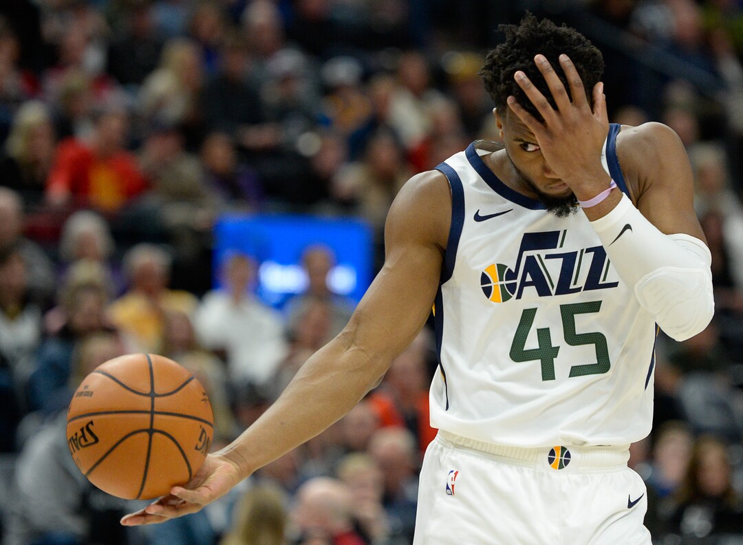 (Francisco Kjolseth  |  The Salt Lake Tribune) Utah Jazz guard Donovan Mitchell (45) takes a hit to the eye as the Utah Jazz host the Orlando Magic in their NBA basketball game at Vivint Smart Home Arena in Salt Lake City on Tuesday. Dec. 17, 2019.