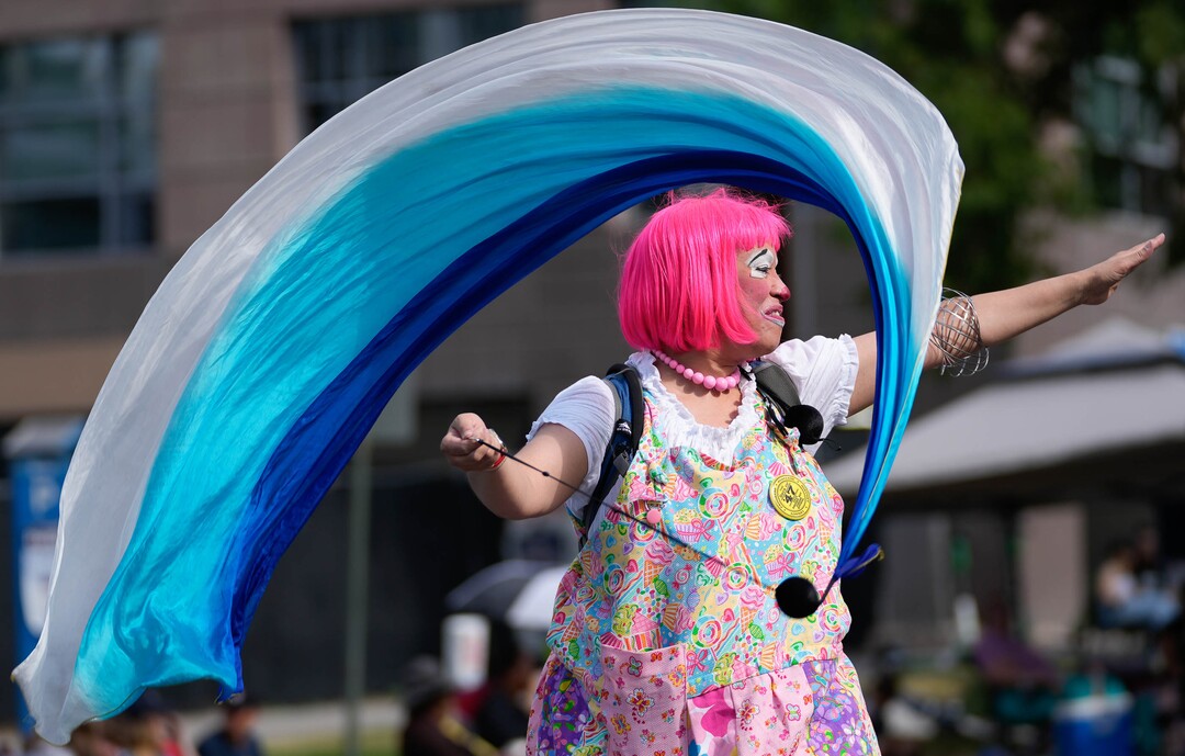(Francisco Kjolseth | The Salt Lake Tribune) Ariane Egbert waves to the crowd as she walks the Days of ’47 Parade in Salt Lake City on Saturday, July 23, 2022.