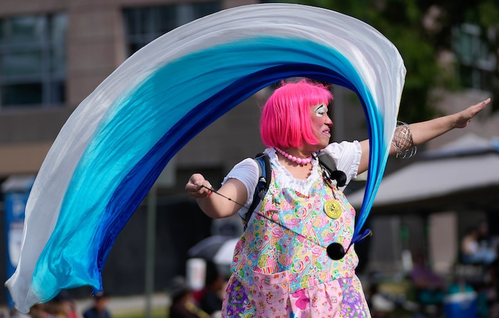 (Francisco Kjolseth | The Salt Lake Tribune) Ariane Egbert waves to the crowd as she walks the Days of ’47 Parade in Salt Lake City on Saturday, July 23, 2022.
