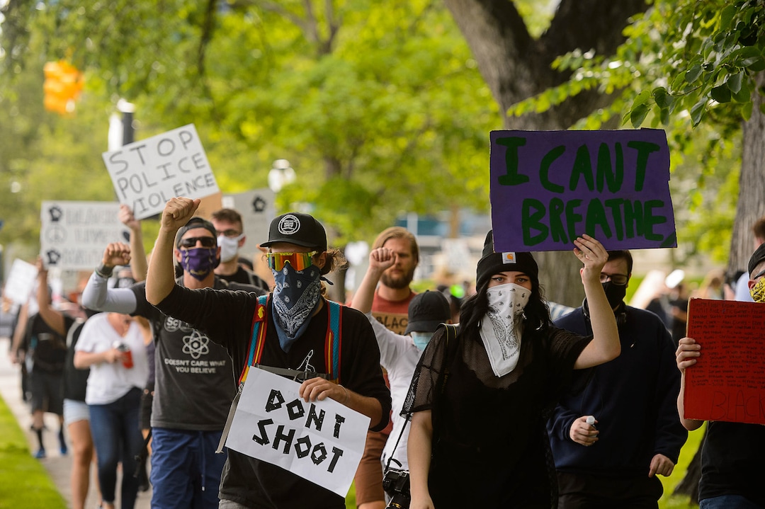 (Trent Nelson  |  The Salt Lake Tribune) Protesters march around City Hall in Salt Lake City on Tuesday, June 2, 2020.