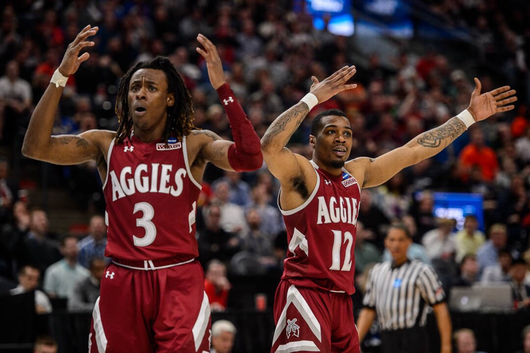 (Trent Nelson | The Salt Lake Tribune)  New Mexico State Aggies guard Terrell Brown (3) and New Mexico State Aggies guard AJ Harris (12) react to a call as Auburn faces New Mexico State in the 2019 NCAA Tournament in Salt Lake City on Thursday March 21, 2019.