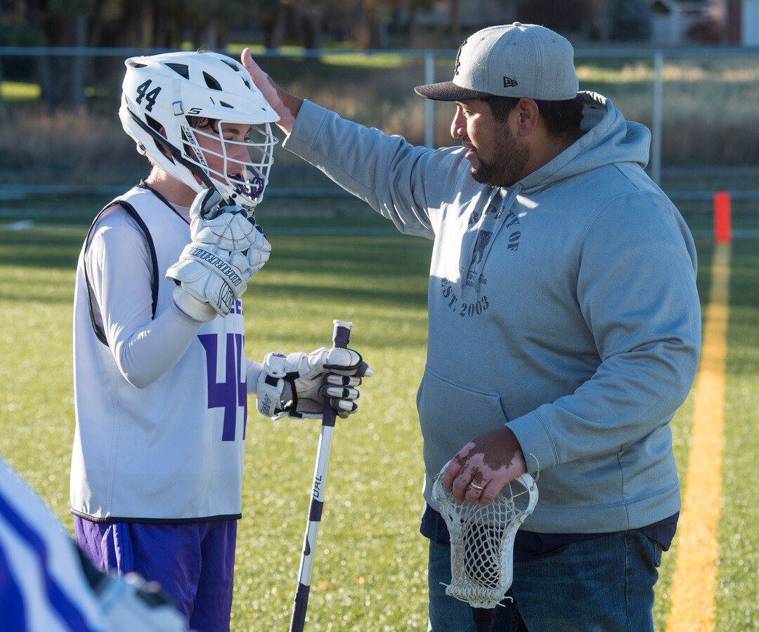 (Rick Egan | The Salt Lake Tribune) Player Seth Linvulle gets instructions from Box Elder lacrosse coach Juan Gaytan during a tournament in Logan on Saturday, Nov. 3, 2018.