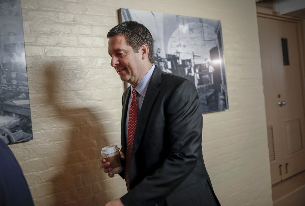 House Intelligence Committee Chairman Devin Nunes, R-Calif., a close ally of President Donald Trump who has become a fierce critic of the FBI and the Justice Department, strides to a GOP conference at the Capitol in Washington, Tuesday, Jan. 30, 2018. House Speaker Paul Ryan is defending a vote by Republicans on the House intelligence committee to release a classified memo on the Russia investigation. (AP Photo/J. Scott Applewhite)