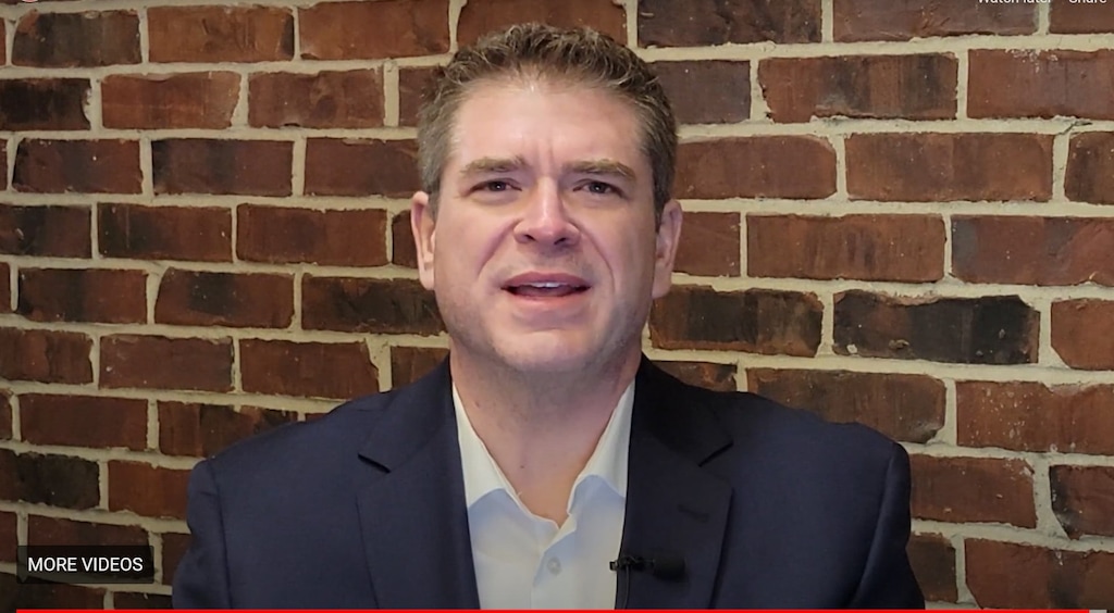 (Screenshot via YouTube) Newly elected chair Chris Null speaks in a Salt Lake County Republican Party convention campaign video.