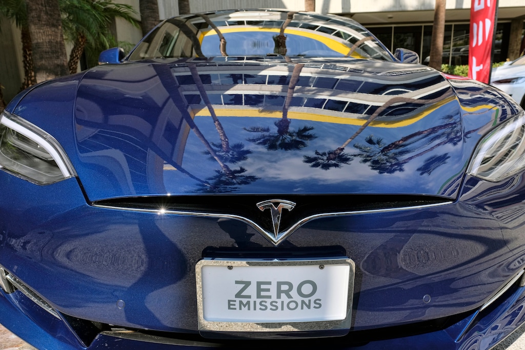 This Monday, Oct. 24, 2016, photo shows a Tesla Model S on display in downtown Los Angeles.  (AP Photo/Richard Vogel)