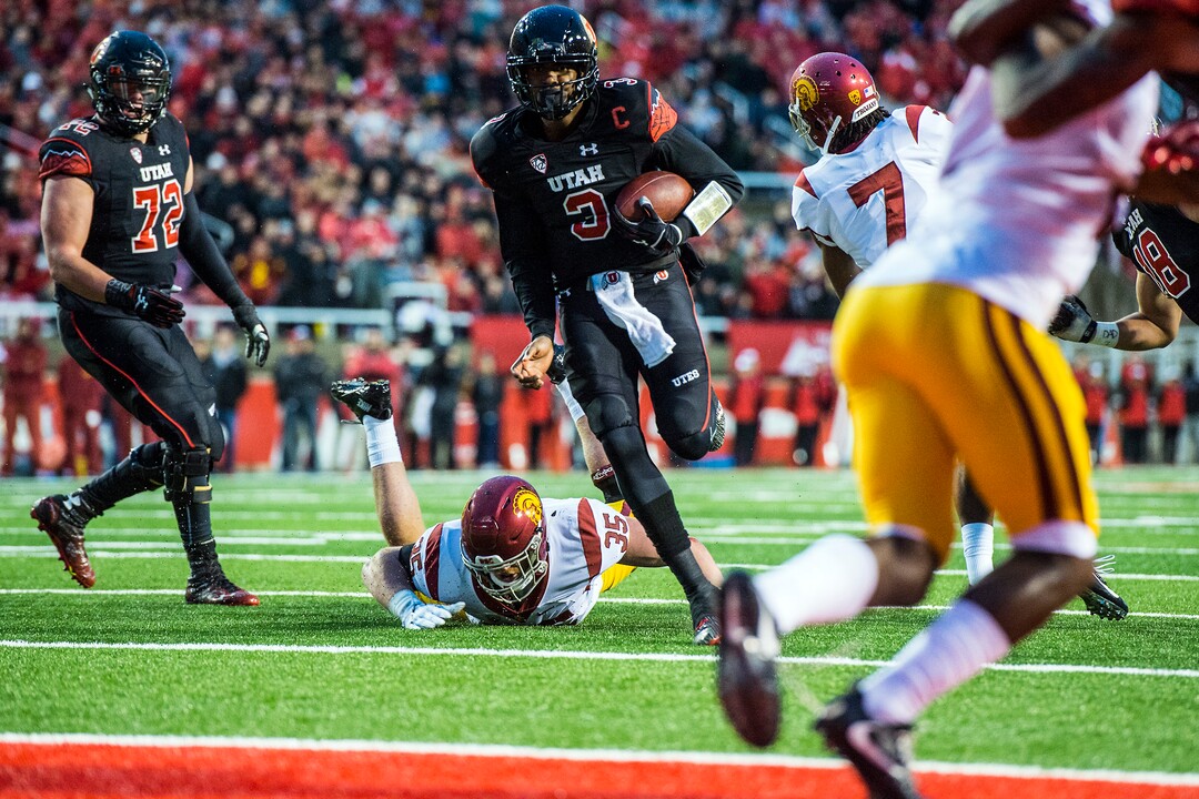 Chris Detrick  |  The Salt Lake TribuneUtah Utes quarterback Troy Williams (3) scores a touchdown past USC Trojans linebacker Cameron Smith (35) and USC Trojans defensive back Marvell Tell III (7) during the first half of the game at Rice-Eccles Stadium Friday September 23, 2016. 