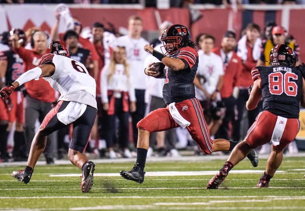 (Leah Hogsten | The Salt Lake Tribune) Utah Utes quarterback Cameron Rising (7) with the keeper as the University of Utah host San Diego State at Rice-Eccles Stadium in Salt Lake City, Sept. 17, 2022. 