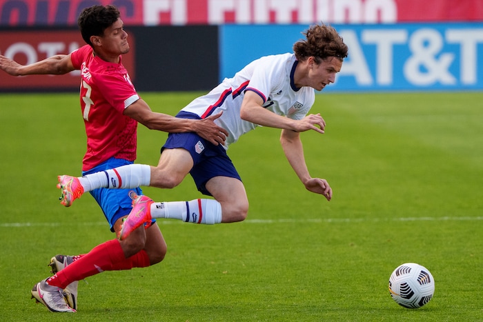 (Trent Nelson  |  The Salt Lake Tribune) United States forward Brenden Aaronson flies, ahead of Costa Rica midfielder Yeltsin Tejeda as the U.S. Men’s National Team (USMNT) faces Costa Rica in a friendly at Rio Tinto Stadium in Sandy on Wednesday, June 9, 2021.