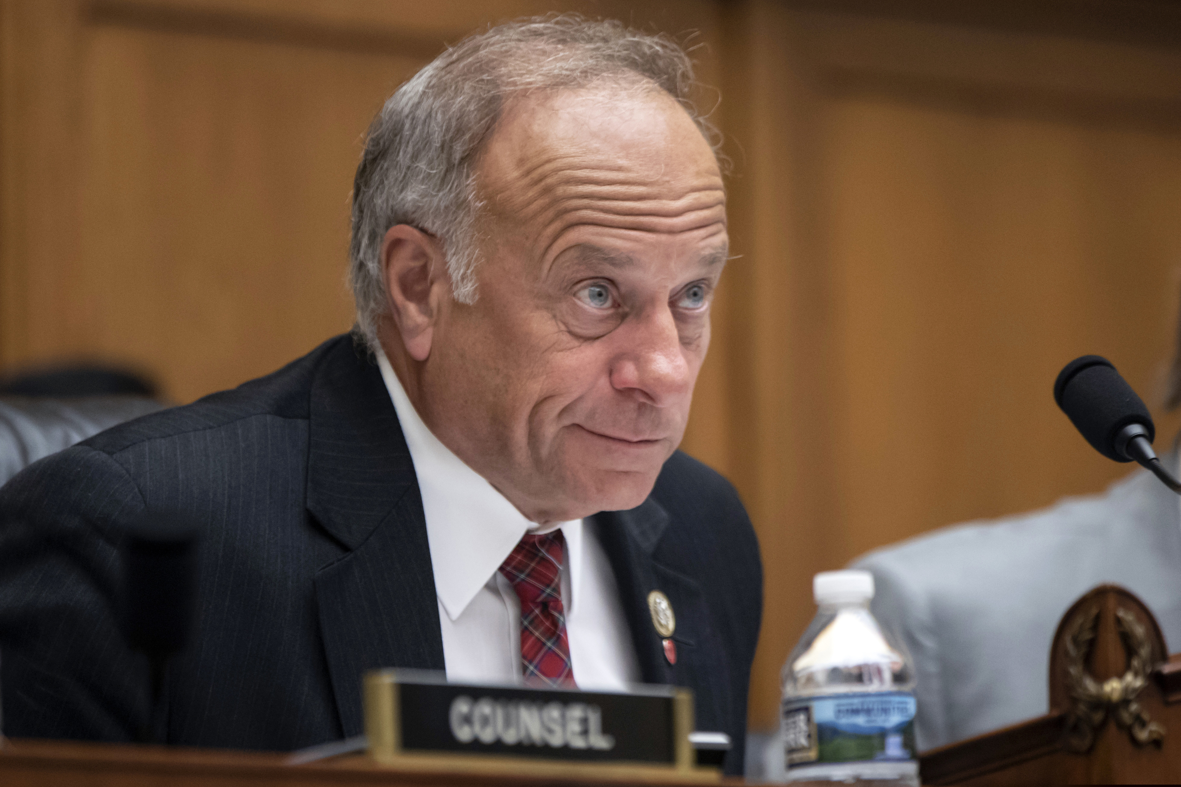 FILE - In this June 8, 2018, file photo, U.S. Rep. Steve King, R-Iowa, listens during a hearing on Capitol Hill in Washington. On Tuesday, Jan. 15, 2019, the House voted 416-1 for a resolution repudiating King’s words expressing puzzlement about why terms like “white nationalist” are offensive. (AP Photo/J. Scott Applewhite, File)