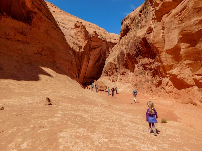 (Erin Alberty|The Salt Lake Tribune) Hikers approach a narrow section of Leprechaun Canyon on April 29, 2017.