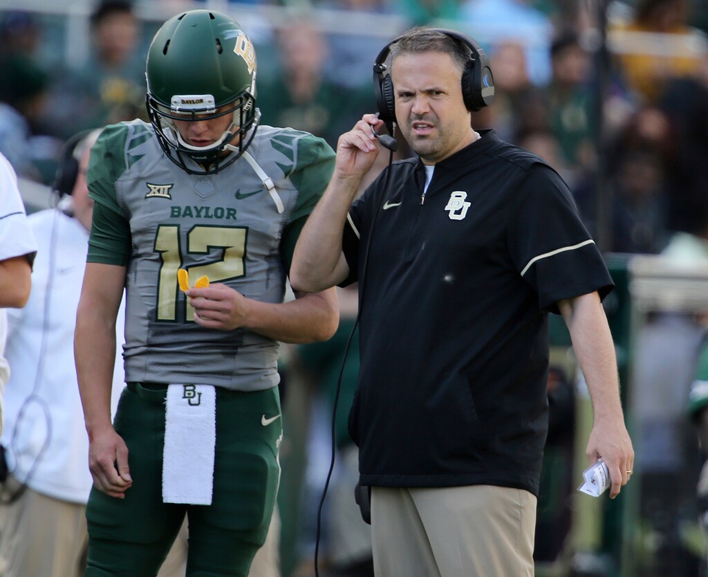 (Rod Aydelotte | Waco Tribune-Herald via AP) Baylor head football coach Matt Rhule, right, looks on with quarterback Charlie Brewer during their matchup with Iowa State in the second half of an NCAA college football game, Saturday, Nov. 18, 2017, in Waco, Texas.