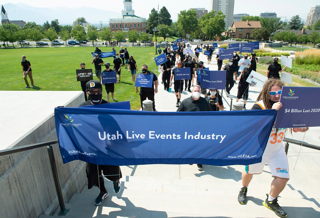 (Rick Egan  |  The Salt Lake Tribune)     More than 100 members of Utah Live Events Industry Association march to the State Capitol in a silent march to call attention to the state of their industry, on Tuesday, July 21, 2020.