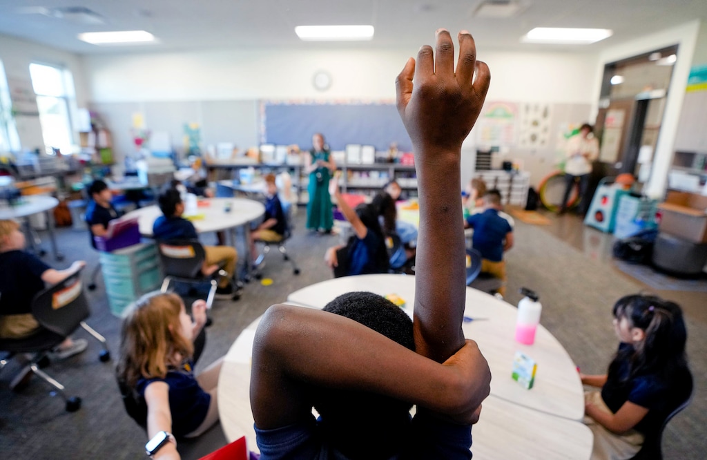 (Francisco Kjolseth | The Salt Lake Tribune) A third grade student raises his hand in a class that's part of the first gifted and talented program on Salt Lake City's west side at Edison Elementary during the first day of school on Tuesday, Aug. 20, 2024.