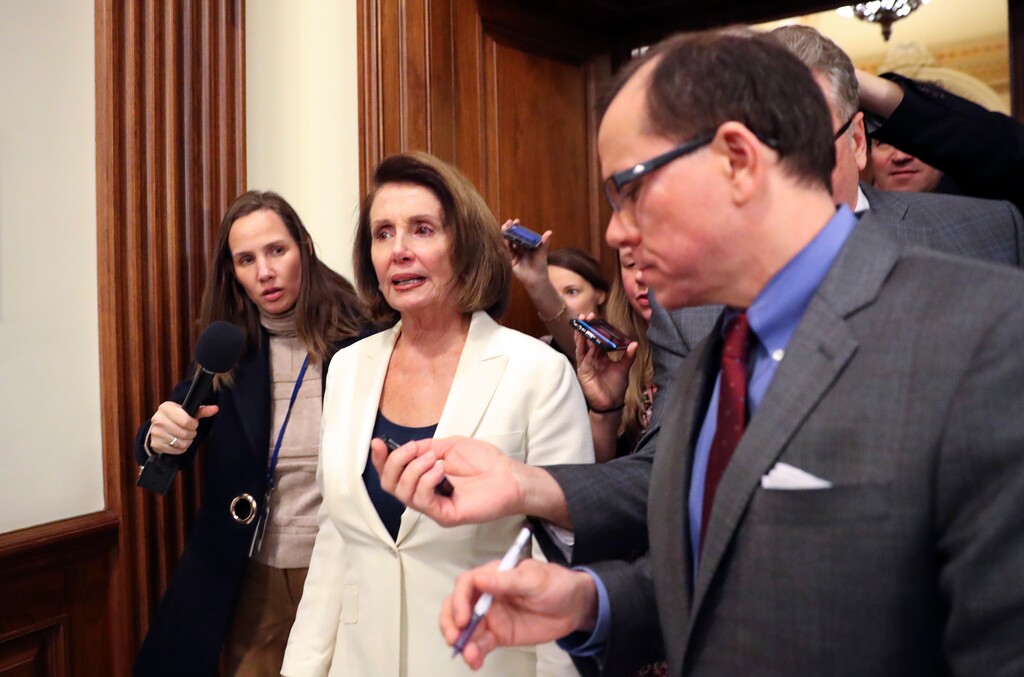 House Minority Leader Nancy Pelosi of Calif., speaks to reporters after she staged a record-breaking, eight-hour speech in hopes of pressuring Republicans to allow a vote on protecting "Dreamer" immigrants on Capitol Hill in Washington. Wednesday, Feb. 7, 2018. (AP Photo/Pablo Martinez Monsivais)