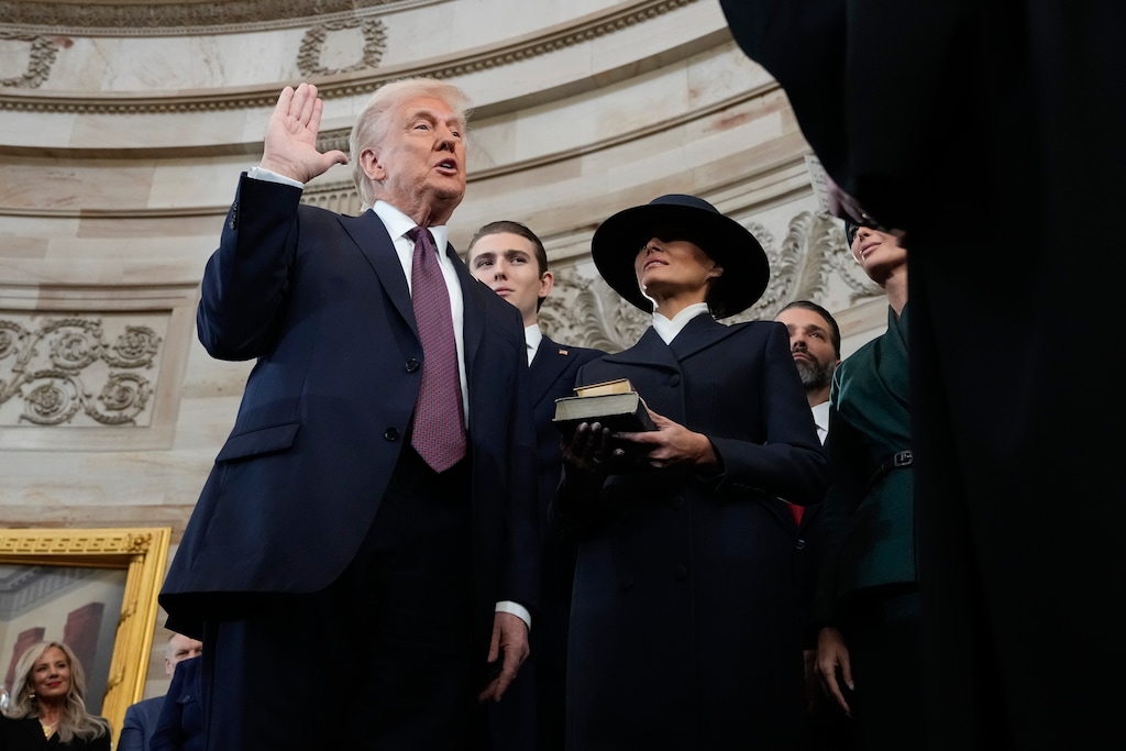 (Morry Gash | AP) Donald Trump is sworn in as the 47th president of the United States by Chief Justice John Roberts as Melania Trump holds the Bible during the 60th Presidential Inauguration in the Rotunda of the U.S. Capitol in Washington, Monday, Jan. 20, 2025.