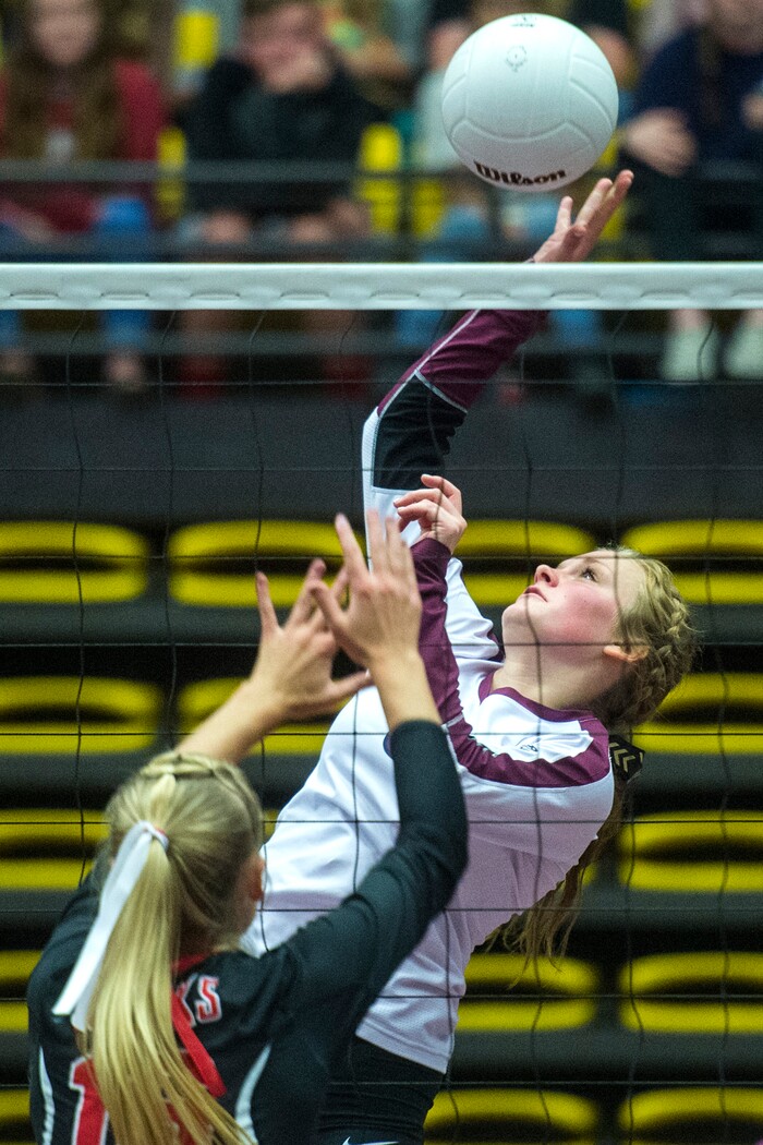(Chris Detrick  |  The Salt Lake Tribune)  Morgan's Brooke Loertscher (5) spikes past North Sanpete's Kelsie Nielson (16) during the the 3A volleyball state championships at the UCCU Center at Utah Valley University Thursday, October 26, 2017.  Morgan defeated North Sanpete 3-0.