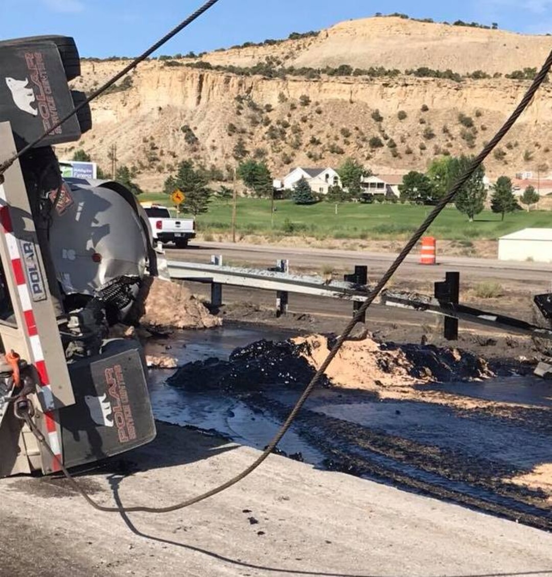 (Photo courtesy Carbon County Sheriff's Department) A truck accident resulted in an 8,000-gallon crude oil leak on Highway 6 in Carbon County.