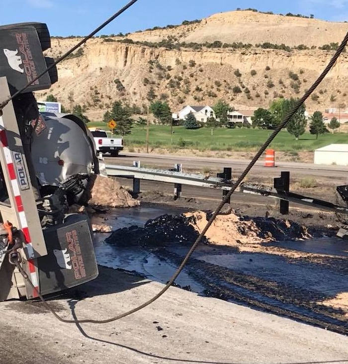 (Photo courtesy Carbon County Sheriff's Department) A truck accident resulted in an 8,000-gallon crude oil leak on Highway 6 in Carbon County.