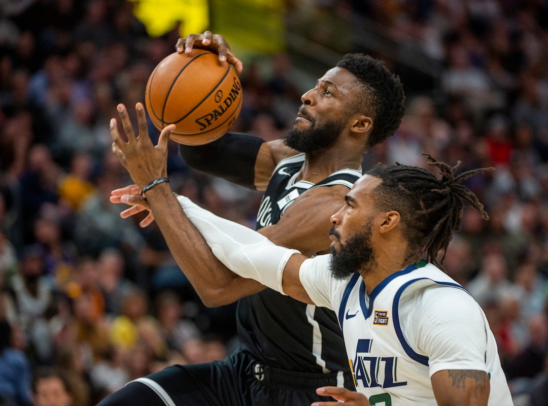 (Rick Egan  |  The Salt Lake Tribune)    Utah Jazz guard Mike Conley (10) stops a fast break by Brooklyn Nets guard David Nwaba (0), in NBA basketball action between the Utah Jazz and the Brooklyn Nets in Salt Lake City, Tuesday, Nov 12, 2019.